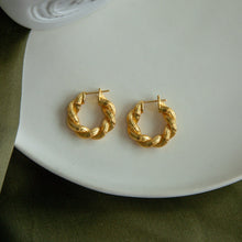 Load image into Gallery viewer, Twisting Gold Hoop Earring
